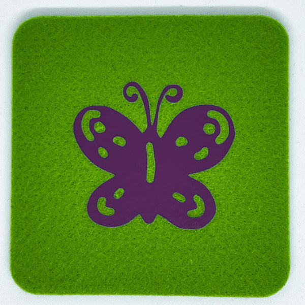 Closeup product image of a bright apple green square wool coaster with a purple butterfly design centered on it