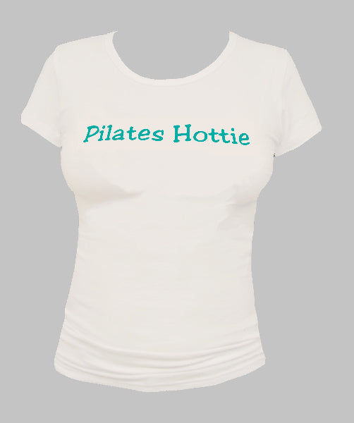 Front view product image of a women's white cap sleeve t-shirt with the words Pilates Hottie printed across the chest in blue