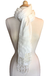 Product image of a cream white color pashmina shawl scarf on a dress form with long fringe