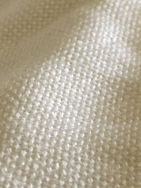 Closeup image of cream color bamboo pashmina scarf fabric texture weave