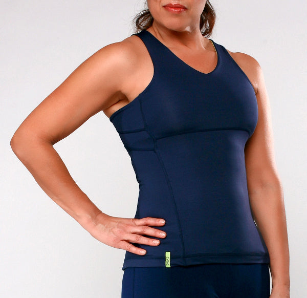 Front view image of a female model wearing navy blue form fitting yoga tank top and blue shorts